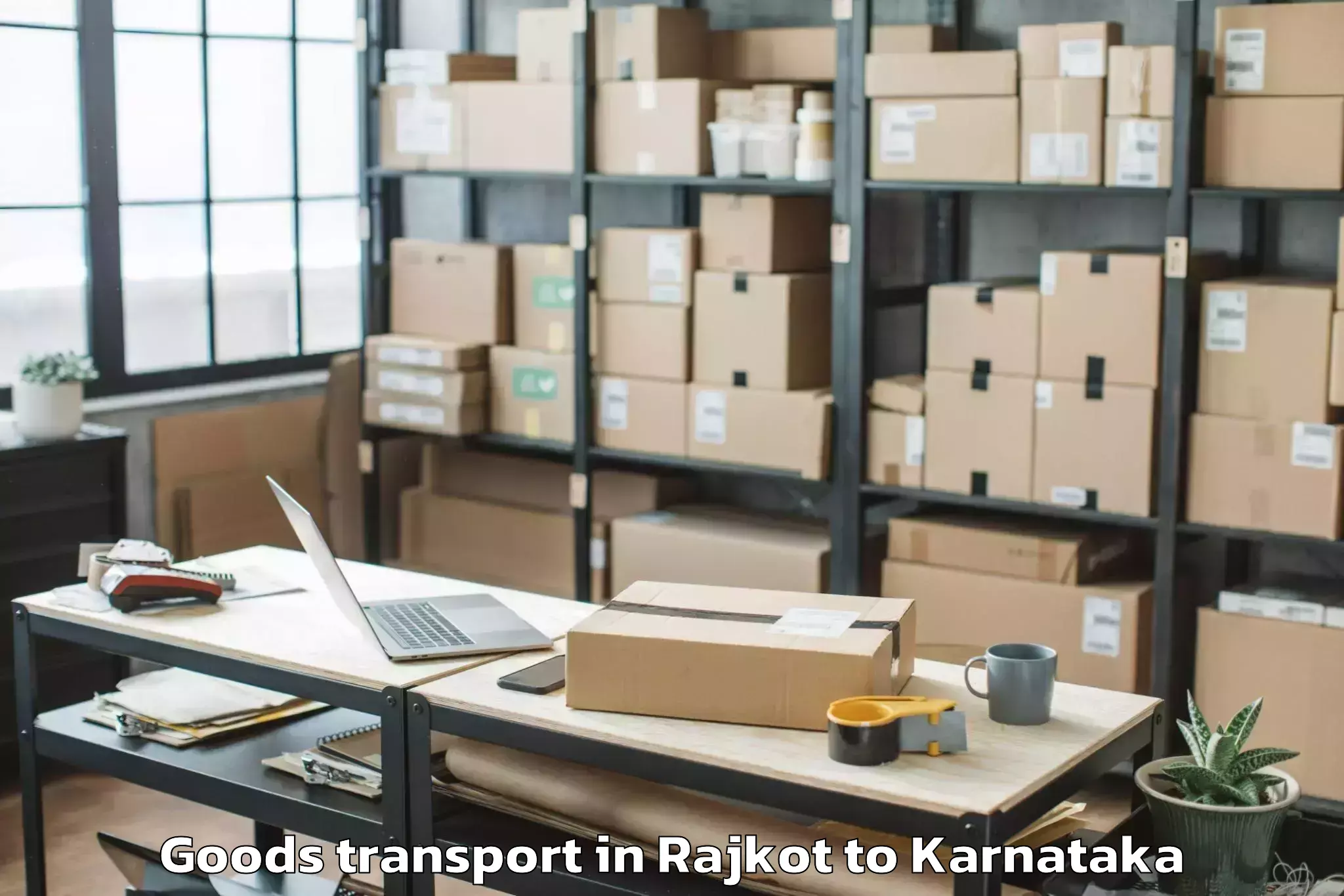 Hassle-Free Rajkot to Abhilashi University Bangalore Goods Transport